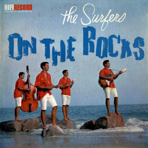 the surfers on the rocks